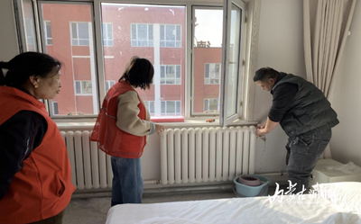 多方聯(lián)動解民憂  八一公寓暖和了