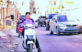 “我家門口鋪上了‘高定’柏油路”