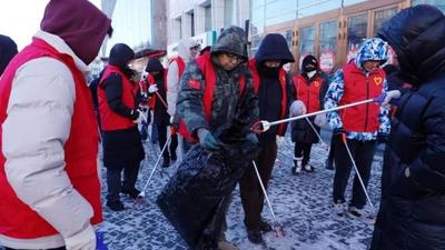 志愿紅點亮文明路 常態(tài)化整治煥新顏