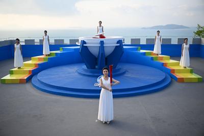 新華社快訊：第六屆亞洲沙灘運(yùn)動(dòng)會(huì)火炬?zhèn)鬟f開(kāi)始